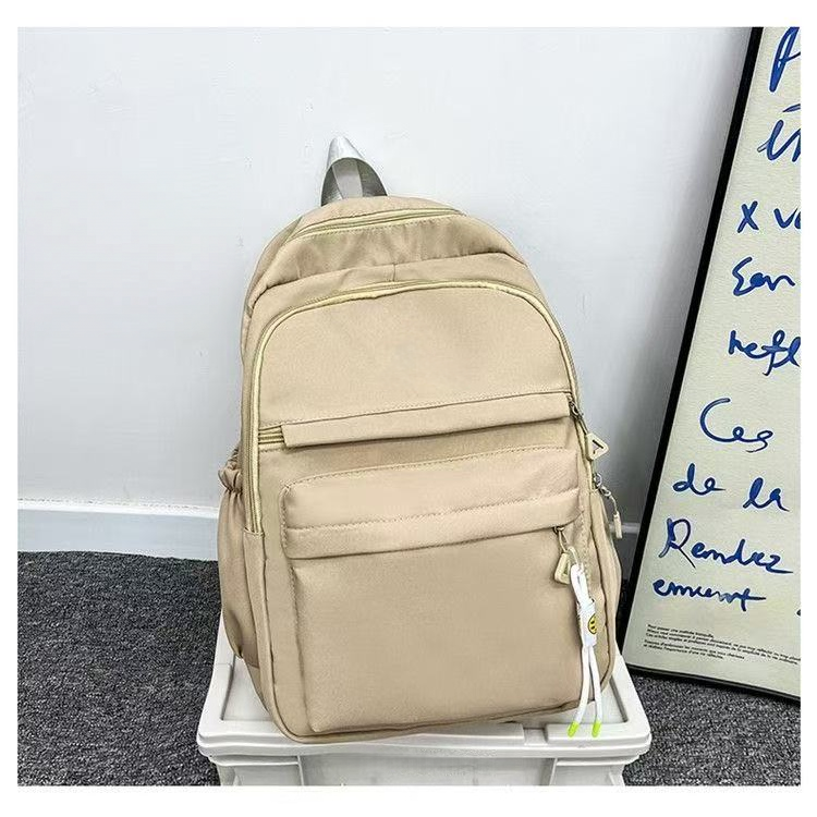 Minimally designed solid color backpack for both shoulders E1305
