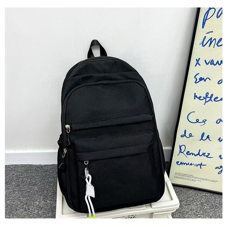 Minimally designed solid color backpack for both shoulders E1305