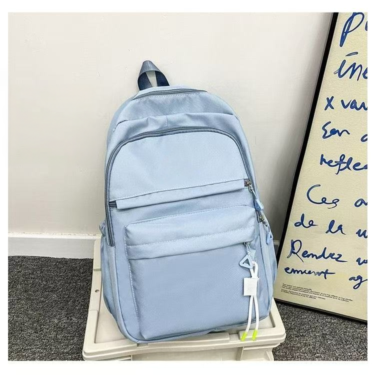 Minimally designed solid color backpack for both shoulders E1305